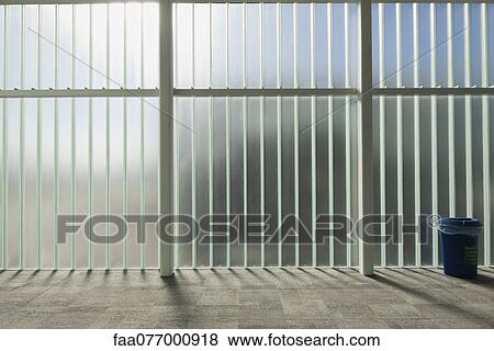 Stock Photo - Glass wall in lobby. Fotosearch
