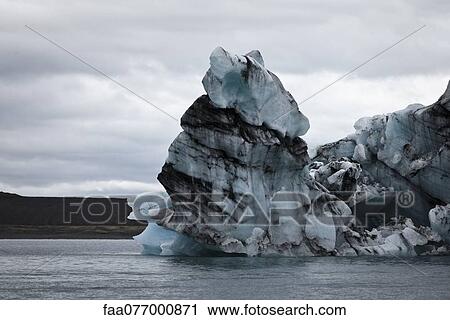 Iceberg in Jokulsarlon glacial lagoon, Iceland View Large Photo Image Stock Image - Iceberg in Jokulsarlon glacial lagoon, Iceland. Fotosearch