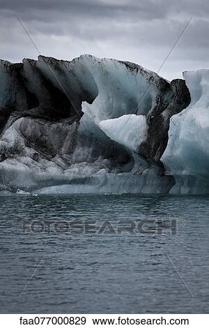 Iceberg in Jokulsarlon glacial lagoon, Iceland View Large Photo Image Stock Photo - Iceberg in Jokulsarlon glacial lagoon, Iceland. Fotosearch
