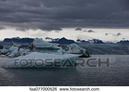 Stock Photograph - Iceberg in Jokulsarlon glacial lagoon, Iceland. Fotosearch