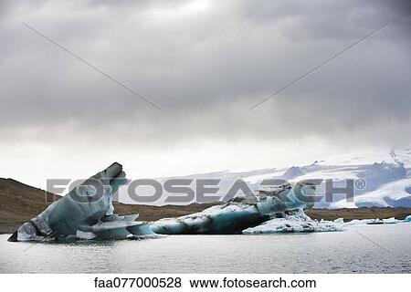 Icebergs in Jokulsarlon glacial lagoon, Iceland View Large Photo Image Stock Photo - Icebergs in Jokulsarlon glacial lagoon, Iceland. Fotosearch