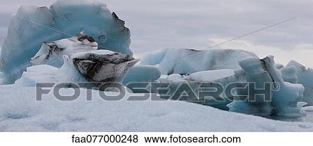 Stock Photo - Icebergs, Jokulsarlon glacial lagoon, Iceland. Fotosearch