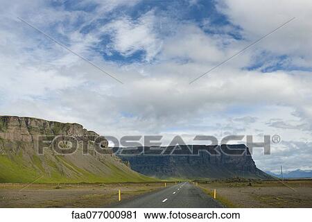 Iceland, road running along cliffs View Large Photo Image Stock Image - Iceland, road running along cliffs. Fotosearch