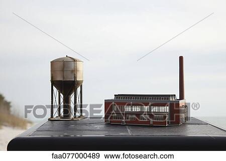 Model factory and water tower View Large Photo Image Stock Photo - Model factory and water tower. Fotosearch