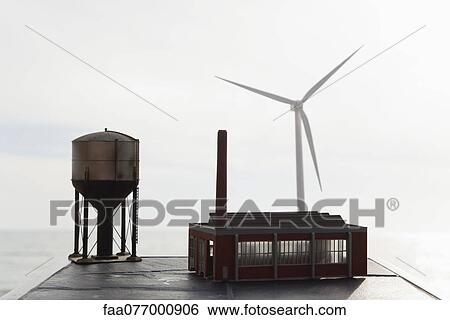 Model factory, water tower and wind turbine View Large Photo Image Stock Photograph - Model factory, water tower and wind turbine. Fotosearch