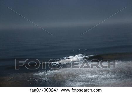 Ocean at night View Large Photo Image Stock Photo - Ocean at night. Fotosearch