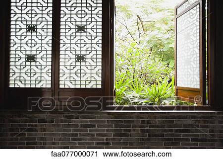 Open window revealing vegetation outdoors View Large Photo Image Stock Image - Open window revealing vegetation outdoors. Fotosearch