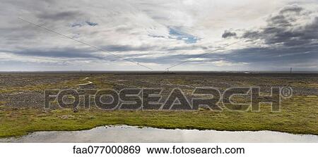 Stock Photo - Panoramic view of barren plain, Iceland. Fotosearch