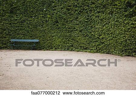 Stock Image - Park bench. Fotosearch