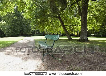 Stock Image - Park bench. Fotosearch