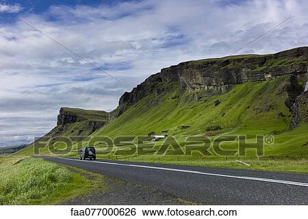 Stock Photograph - Road through countryside, Iceland. Fotosearch