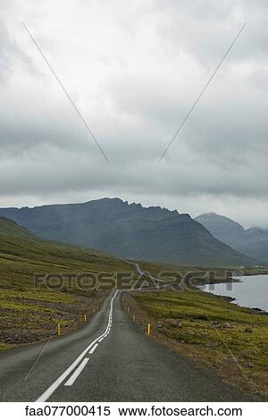 Stock Photography - Road winding along coast, Iceland. Fotosearch