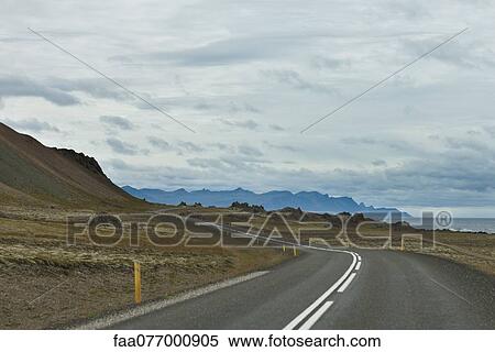 Road winding through mountain landscape, Iceland View Large Photo Image Stock Photography - Road winding through mountain landscape, Iceland. Fotosearch