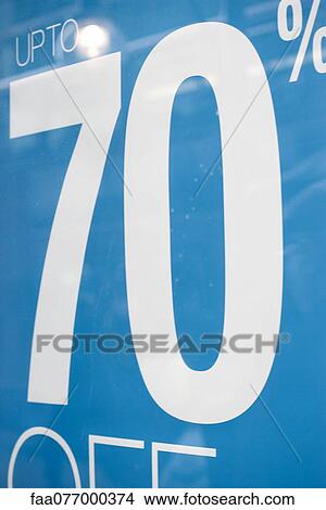 Sale sign advertising seventy percent off View Large Photo Image Picture - Sale sign advertising seventy percent off. Fotosearch