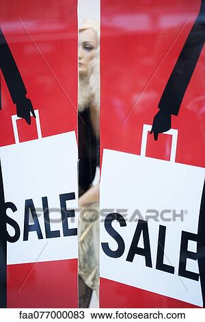 Sale signs in shop window View Large Photo Image Stock Image - Sale signs in shop window. Fotosearch