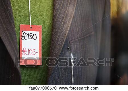 Stock Image - Sale tag on clothing. Fotosearch