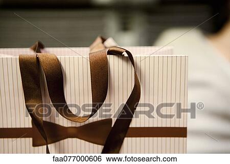 Stock Photograph - Shopping bag, close-up. Fotosearch