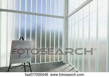 Sign in lobby indicating "check-in" View Large Photo Image Stock Photograph - Sign in lobby indicating "check-in". Fotosearch