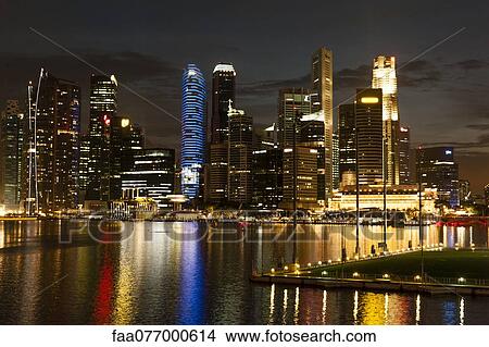 Picture - Singapore, waterfront skyline viewed from esplanade at night. Fotosearch