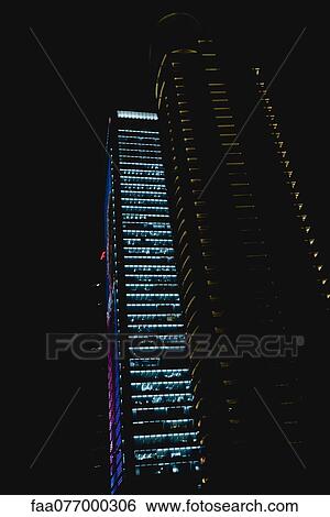 Skyscrapers illumiinated at night, Shanghai, China View Large Photo Image Stock Photograph - Skyscrapers illumiinated at night, Shanghai, China. Fotosearch