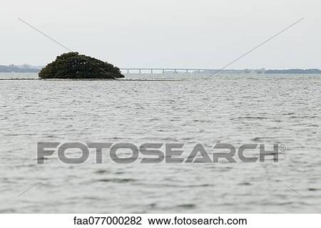 Small island in bay View Large Photo Image Stock Image - Small island in bay. Fotosearch
