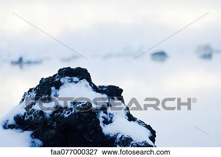 Volcanic rock covered in silica mineral deposits, Blue Lagoon, Reykjanes Peninsula, Iceland View Large Photo Image Stock Photo - Volcanic rock covered in silica mineral deposits, Blue Lagoon, Reykjanes Peninsula, Iceland. Fotosearch
