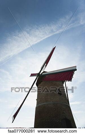 Stock Image - Windmill, low angle view. Fotosearch