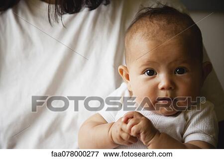 Stock Photo - Baby girl, portrait. Fotosearch