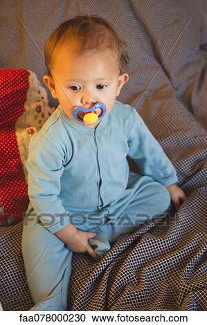 Baby girl wearing pajamas View Large Photo Image Stock Image - Baby girl wearing pajamas. Fotosearch