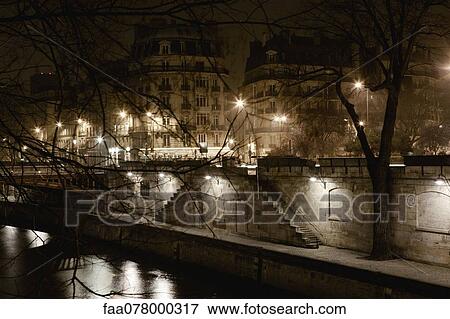 Bank of Seine river by night, Paris, France View Large Photo Image Stock Photo - Bank of Seine river by night, Paris, France. Fotosearch