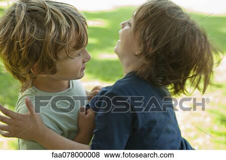 Boys play fighting View Large Photo Image Stock Photo - Boys play fighting. Fotosearch