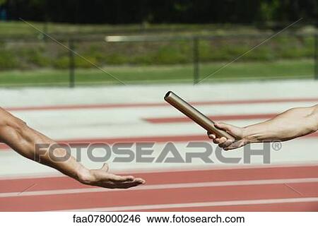 Businessman crouched at starting line on running track View Large Photo Image Stock Photograph - Businessman crouched at starting line on running track. Fotosearch