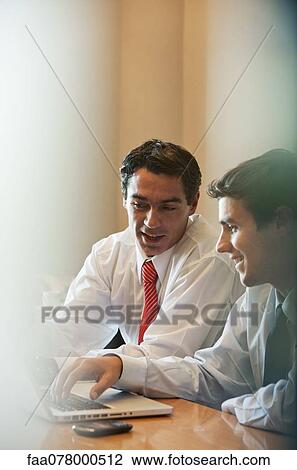 Businessmen in discussion View Large Photo Image Stock Image - Businessmen in discussion. Fotosearch