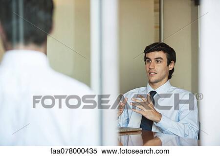Businessmen in meeting View Large Photo Image Stock Photography - Businessmen in meeting. Fotosearch