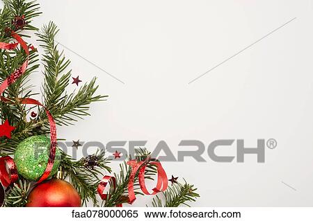 Stock Photography - Christmas decorations on white background. Fotosearch