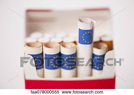 Cigarette pack containing rolled euros View Large Photo Image Stock Photography - Cigarette pack containing rolled euros. Fotosearch