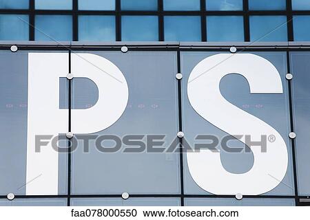Stock Image - Close-up of text painted on building facade. Fotosearch