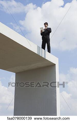 Digital tablets are yet another wireless device allowing greater mobility for business professionals View Large Photo Image Stock Photo - Digital tablets are yet another wireless device allowing greater mobility for business professionals. Fotosearch