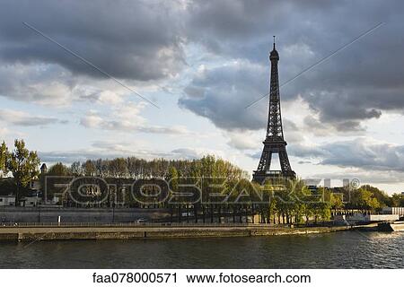 Stock Image - Eiffel Tower viewed from Seine River, Paris, France. Fotosearch