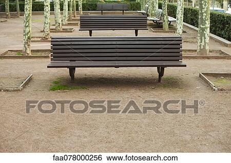 Stock Photograph - Empty park benches. Fotosearch