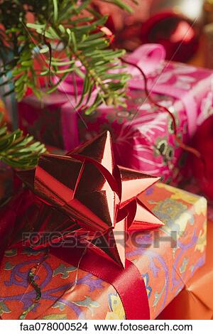 Festively wrapped Christmas gifts View Large Photo Image Picture - Festively wrapped Christmas gifts. Fotosearch