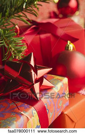 Festively wrapped Christmas gifts View Large Photo Image Stock Image - Festively wrapped Christmas gifts. Fotosearch