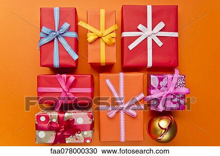 Stock Image - Festively wrapped Christmas gifts. Fotosearch
