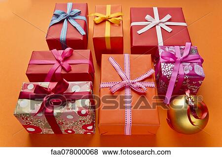 Stock Photo - Festively wrapped Christmas gifts. Fotosearch