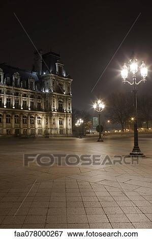 France, Paris, Place de l'Hotel de Ville illuminated at night View Large Photo Image Stock Photo - France, Paris, Place de l'Hotel de Ville illuminated at night. Fotosearch