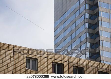Stock Photo - Modern high rise buildings, cropped. Fotosearch