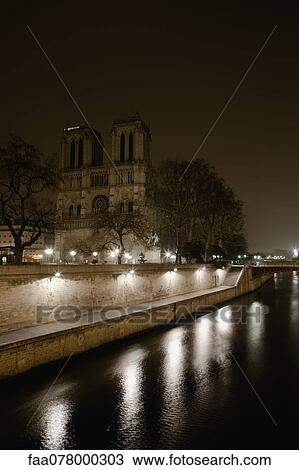 Notre Dame de Paris viewed over Seine river, Paris, France View Large Photo Image Stock Image - Notre Dame de Paris viewed over Seine river, Paris, France. Fotosearch