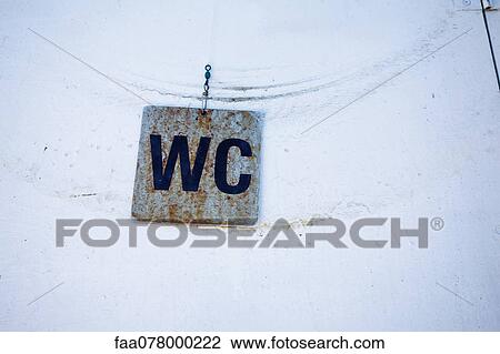 Restroom sign marked "WC" View Large Photo Image Stock Image - Restroom sign marked "WC". Fotosearch