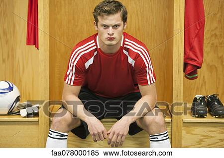 Soccer player sitting in locker room View Large Photo Image Stock Photography - Soccer player sitting in locker room. Fotosearch