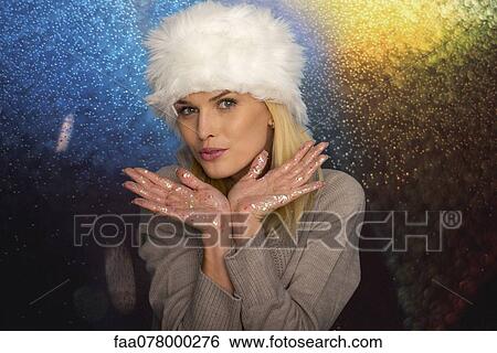 Woman with glitter confetti on hands, portrait View Large Photo Image Stock Photograph - Woman with glitter confetti on hands, portrait. Fotosearch